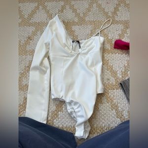 Really flattering asymmetrical body suit